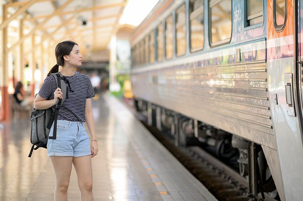 Traveling girl in train station