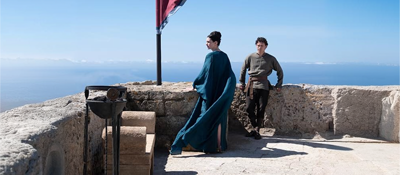 Anne Hathaway and Tom Holland in The Odyssey movie scene.