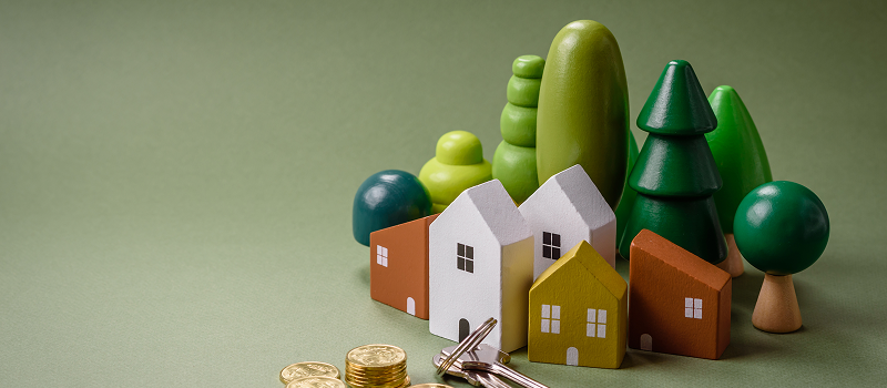 A set of apartment keys sitting on top of a lease contract alongside a housing deposit receipt